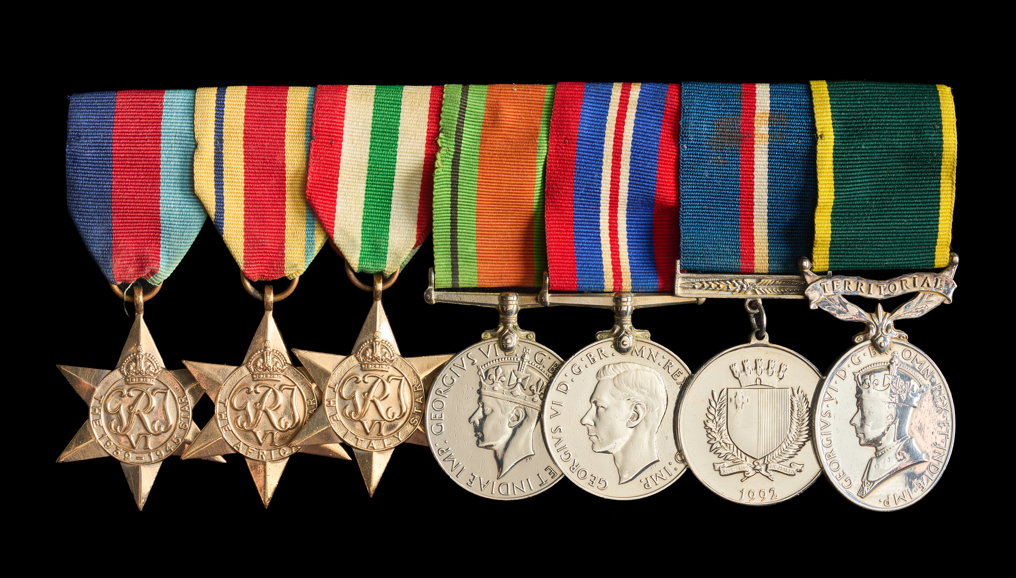 Gerard Rayner : (L to R) 1939-45 Star; Africa Star; Italy Star; Defence Medal; War Medal 1939-45; Malta George Cross 50th Anniversary Medal; Efficiency Medal